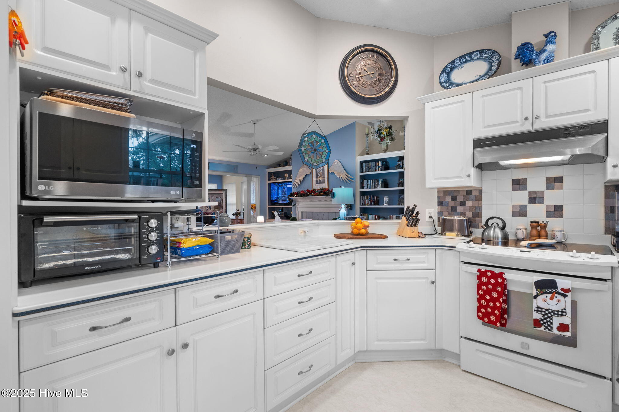 247 Longleaf Drive West End, NC 27376 - Photo 13 of 79 View of the kitchen looking into the living area.