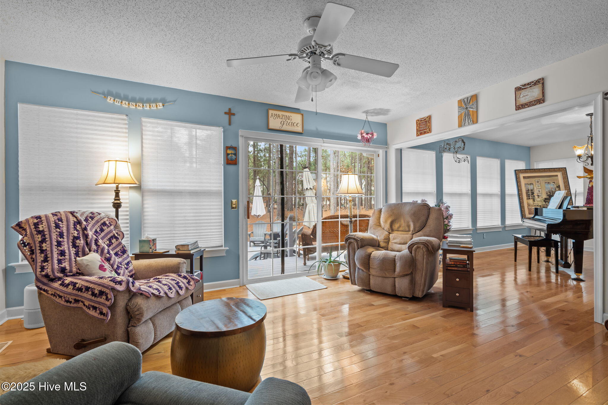 247 Longleaf Drive West End, NC 27376 - Photo 19 of 79 View of Carolina room with access to the deck and patio area.
