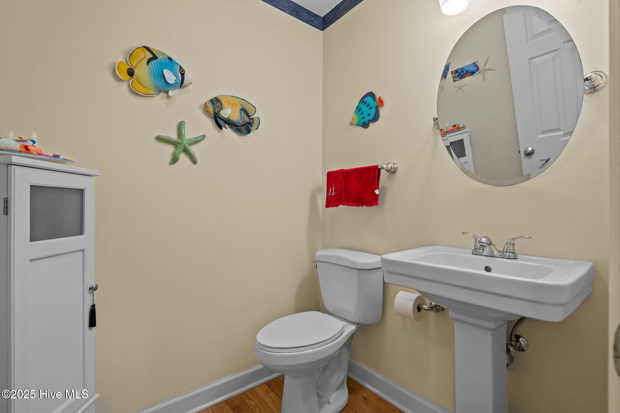 247 Longleaf Drive West End, NC 27376 - Photo 29 of 79 Powder room in hallway with laundry room and garage access.