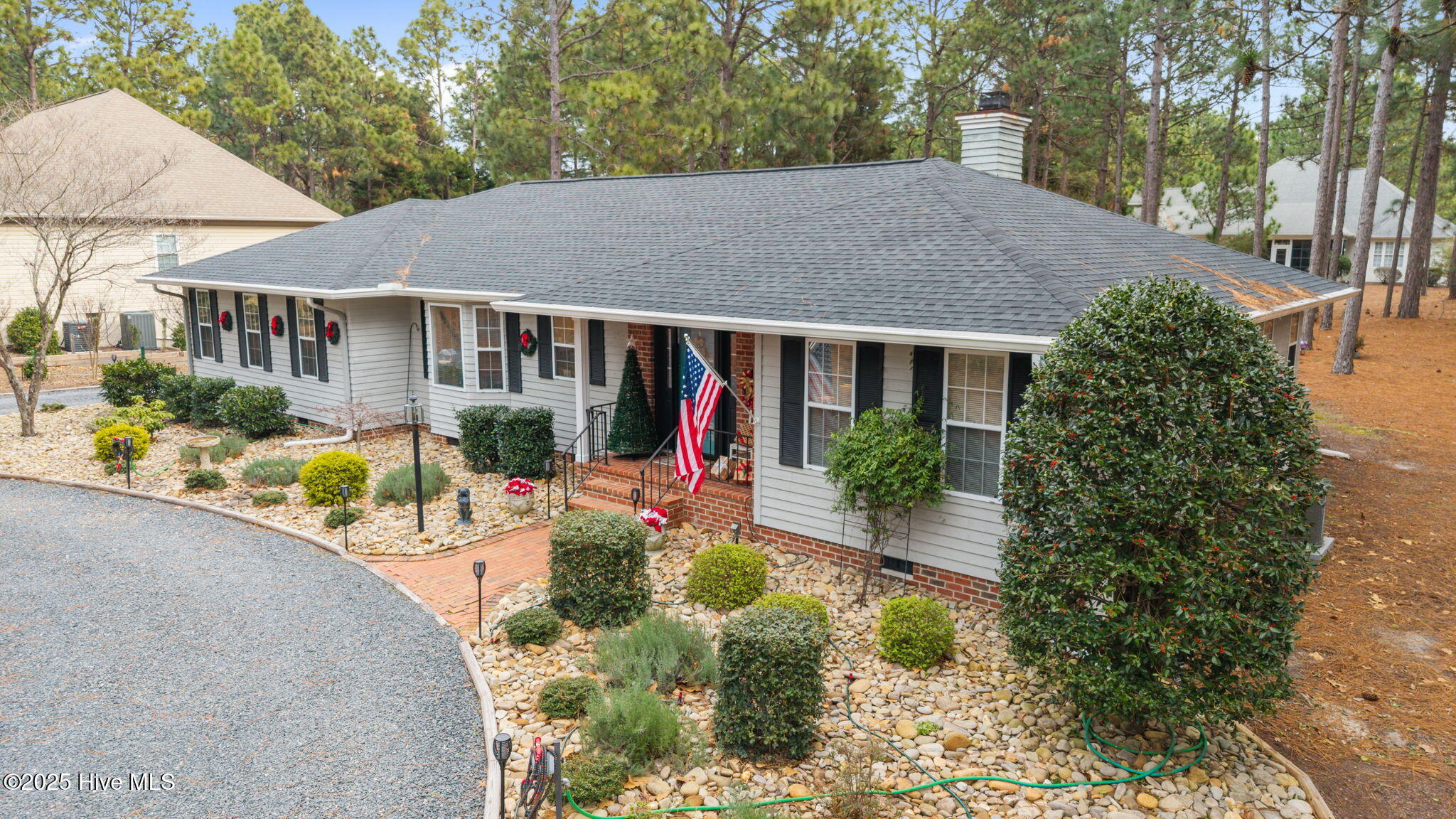247 Longleaf Drive West End, NC 27376 - Photo 4 of 79 View of front of the home with a nice front porch for relaxing on.