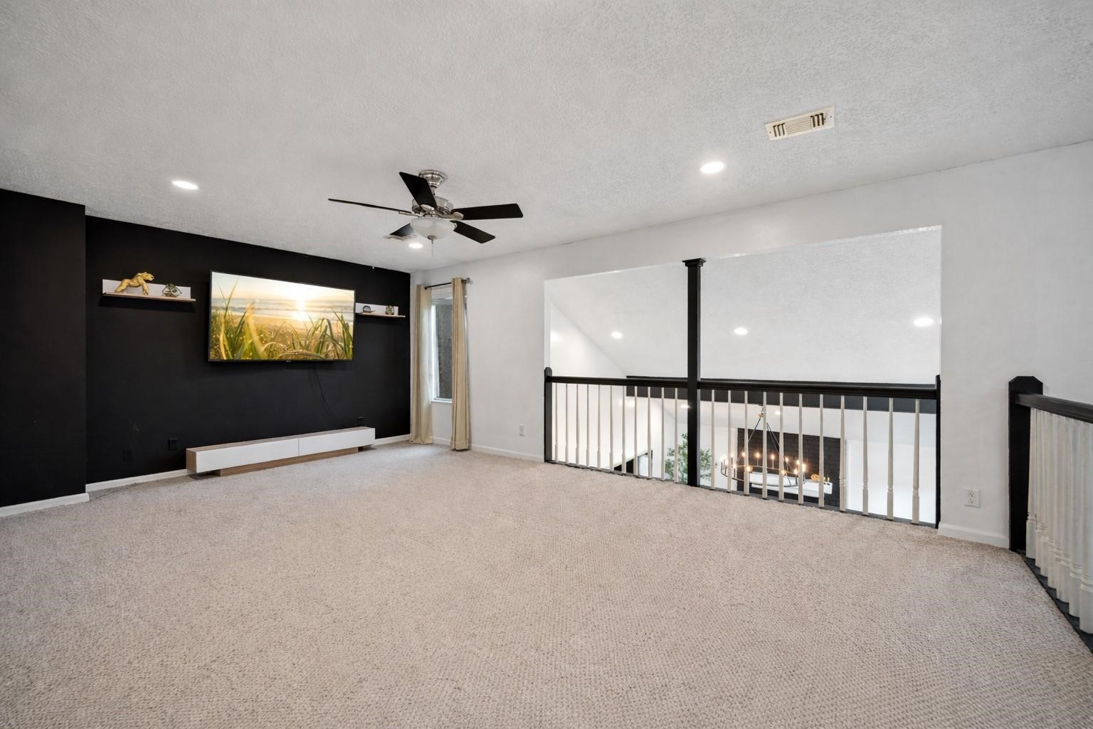 14907 Oak Bluff Court Houston, TX 77070 - Photo 18 of 19 Expansive upstairs loft perfect for a game room or home office.