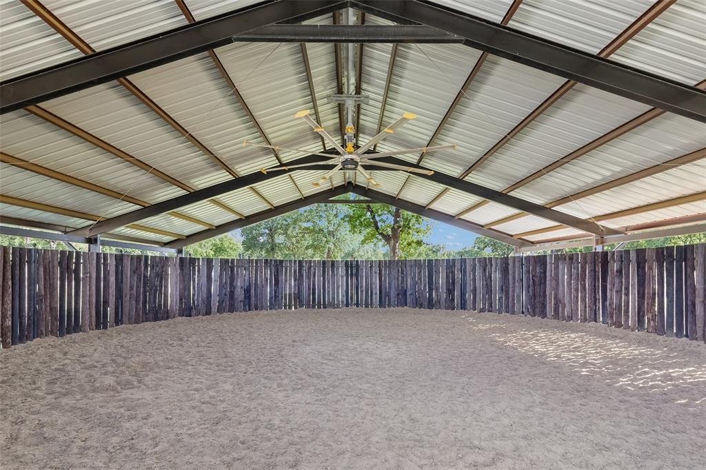 12630 Merrill Road Pilot Point, TX 76258 - Photo 31 of 39 Covered Round Pen with custom footing and big ass fan.