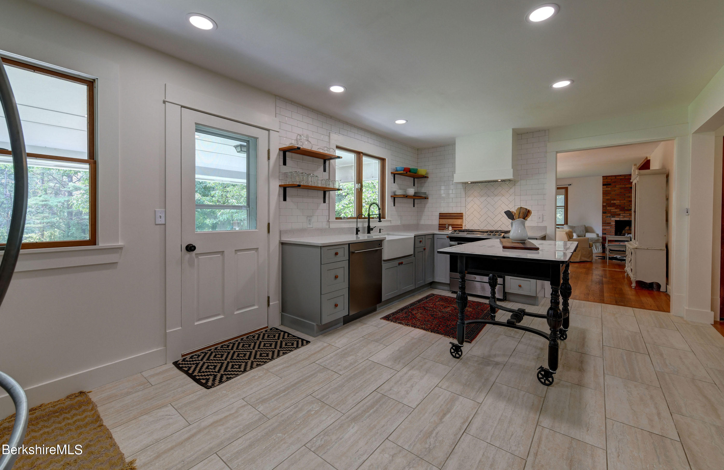 465 Devon Road Lee, MA 01238 - Photo 12 of 36 a workspace with wooden floor and a window