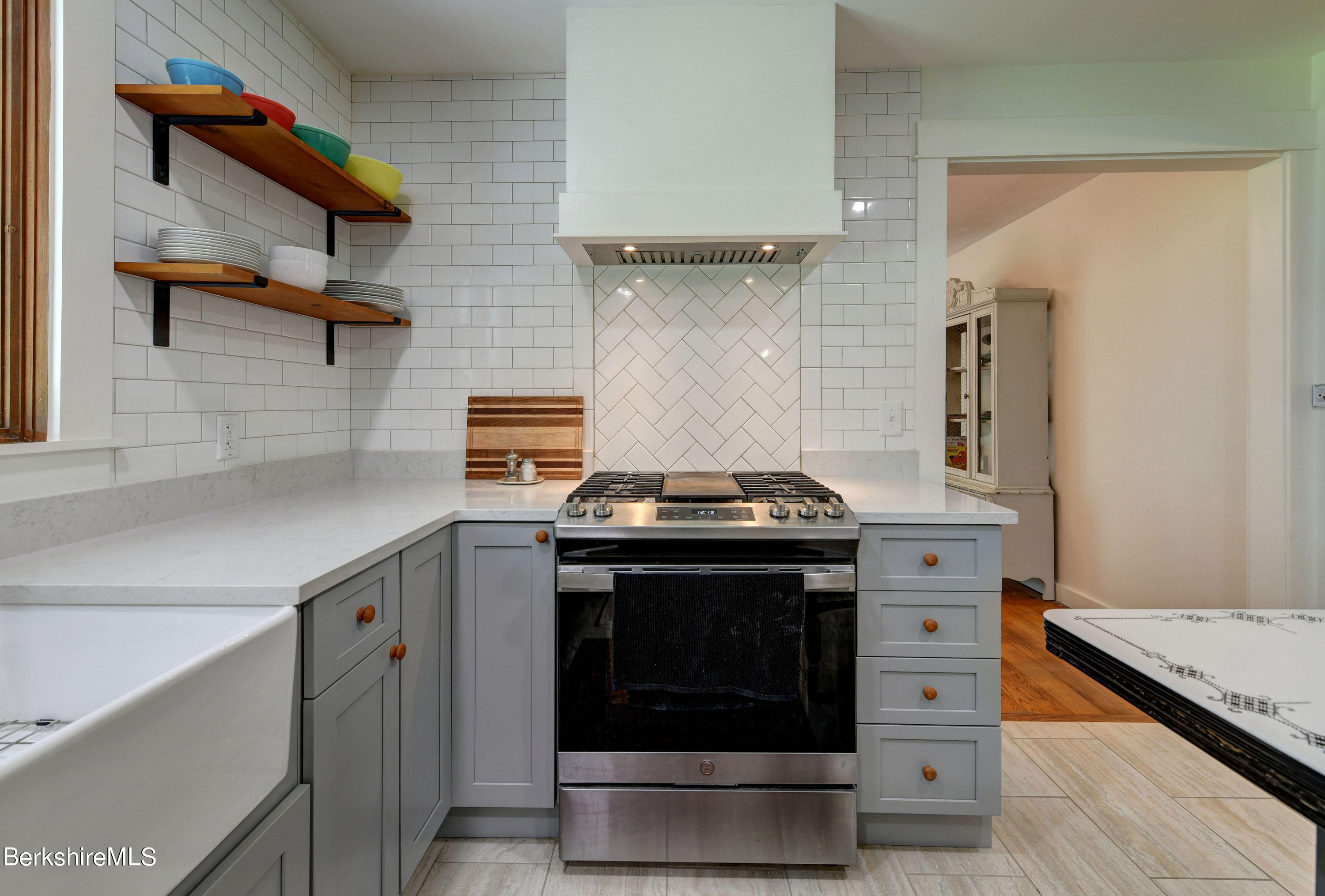 465 Devon Road Lee, MA 01238 - Photo 14 of 36 a stove top oven sitting inside of a kitchen
