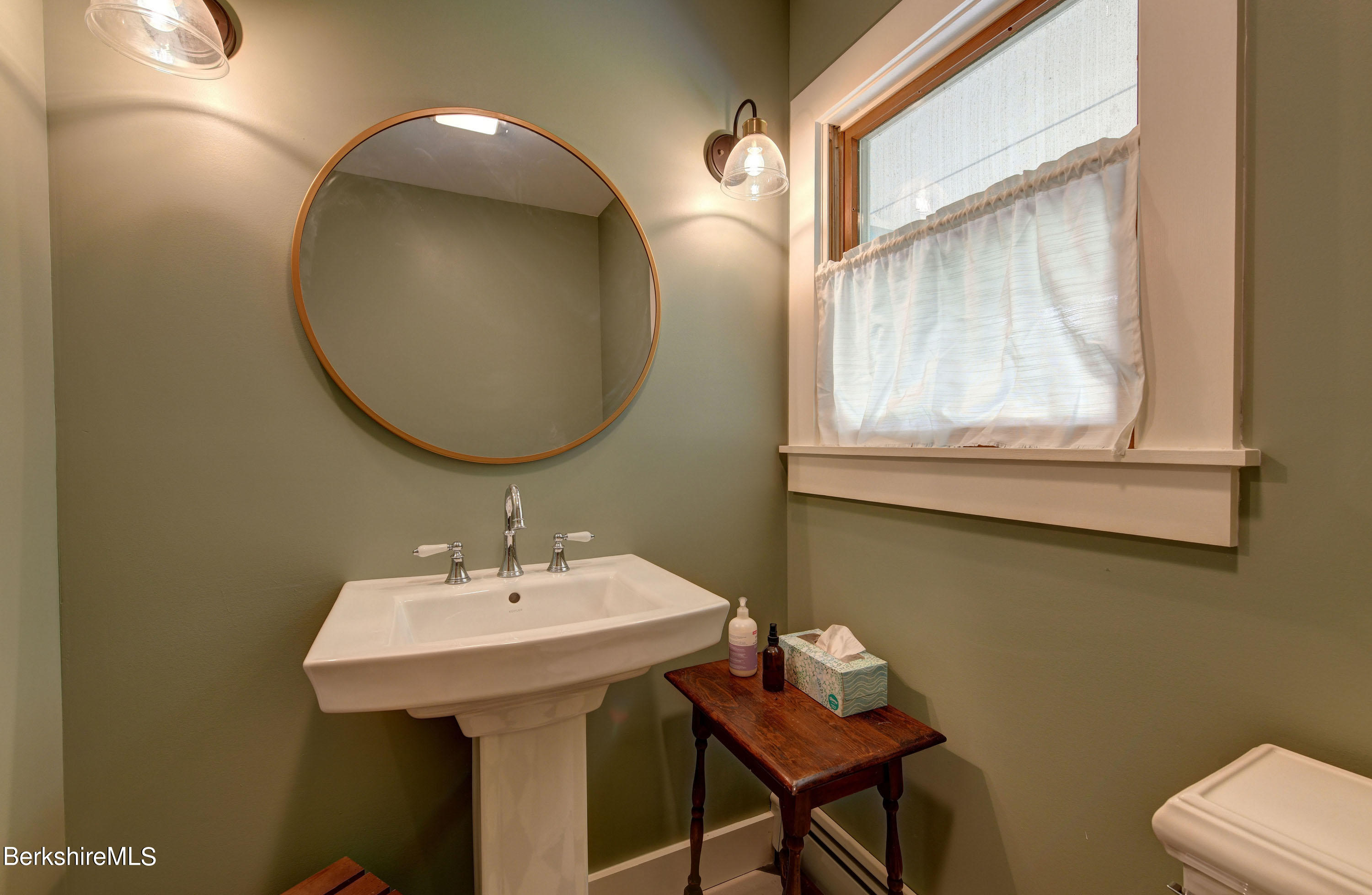 465 Devon Road Lee, MA 01238 - Photo 17 of 36 a bathroom with a sink and a mirror