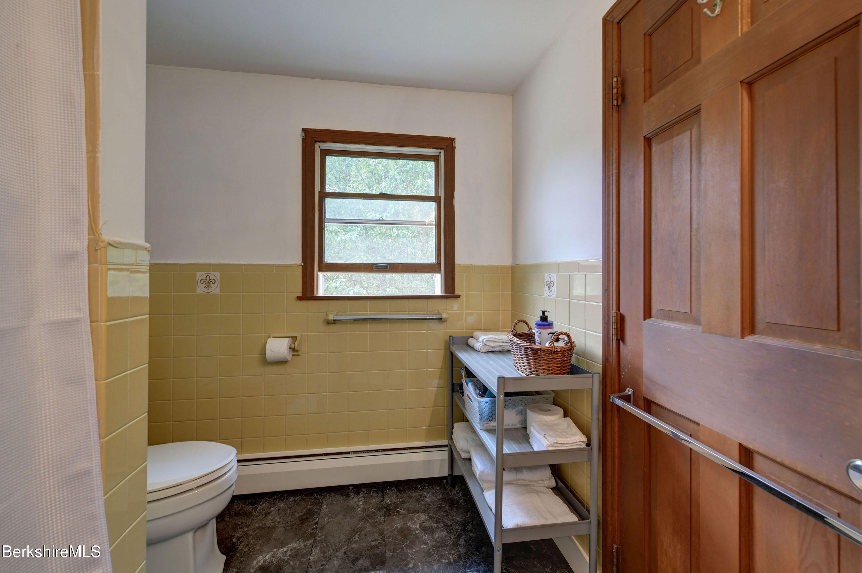 465 Devon Road Lee, MA 01238 - Photo 22 of 36 a room with a chair and a window