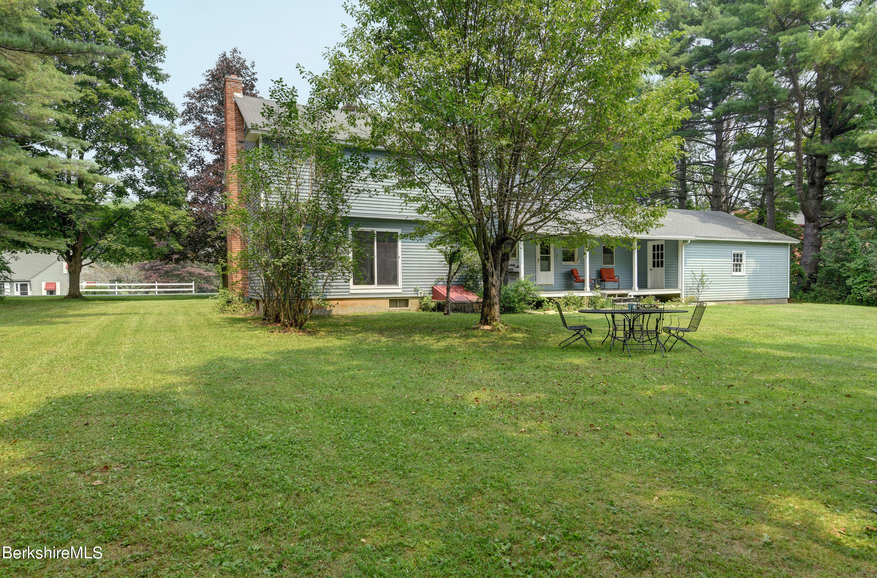 465 Devon Road Lee, MA 01238 - Photo 33 of 36 a front view of a house with a garden
