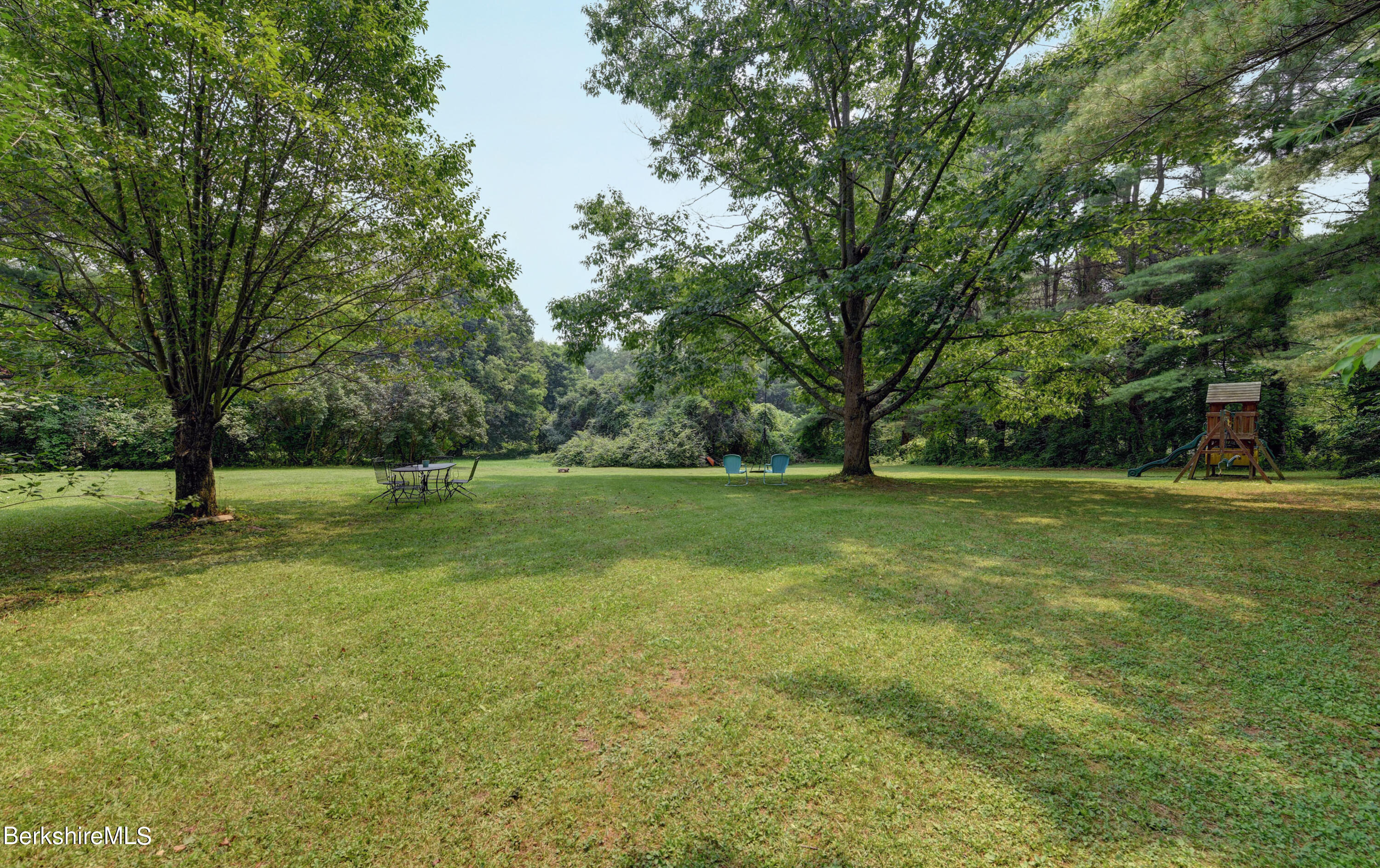 465 Devon Road Lee, MA 01238 - Photo 36 of 36 a view of outdoor space with deck and trees