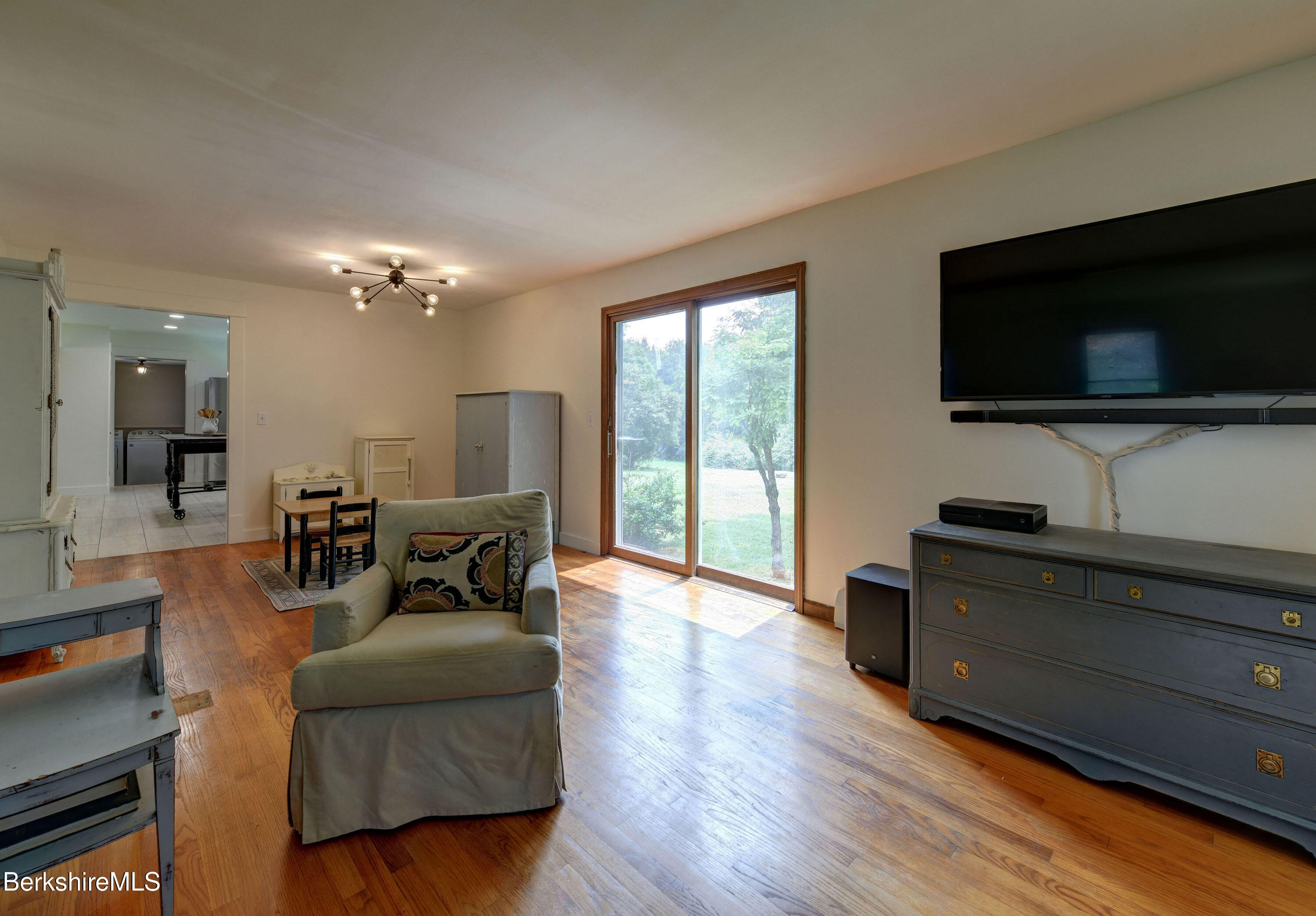 465 Devon Road Lee, MA 01238 - Photo 7 of 36 a living room with furniture and a flat screen tv