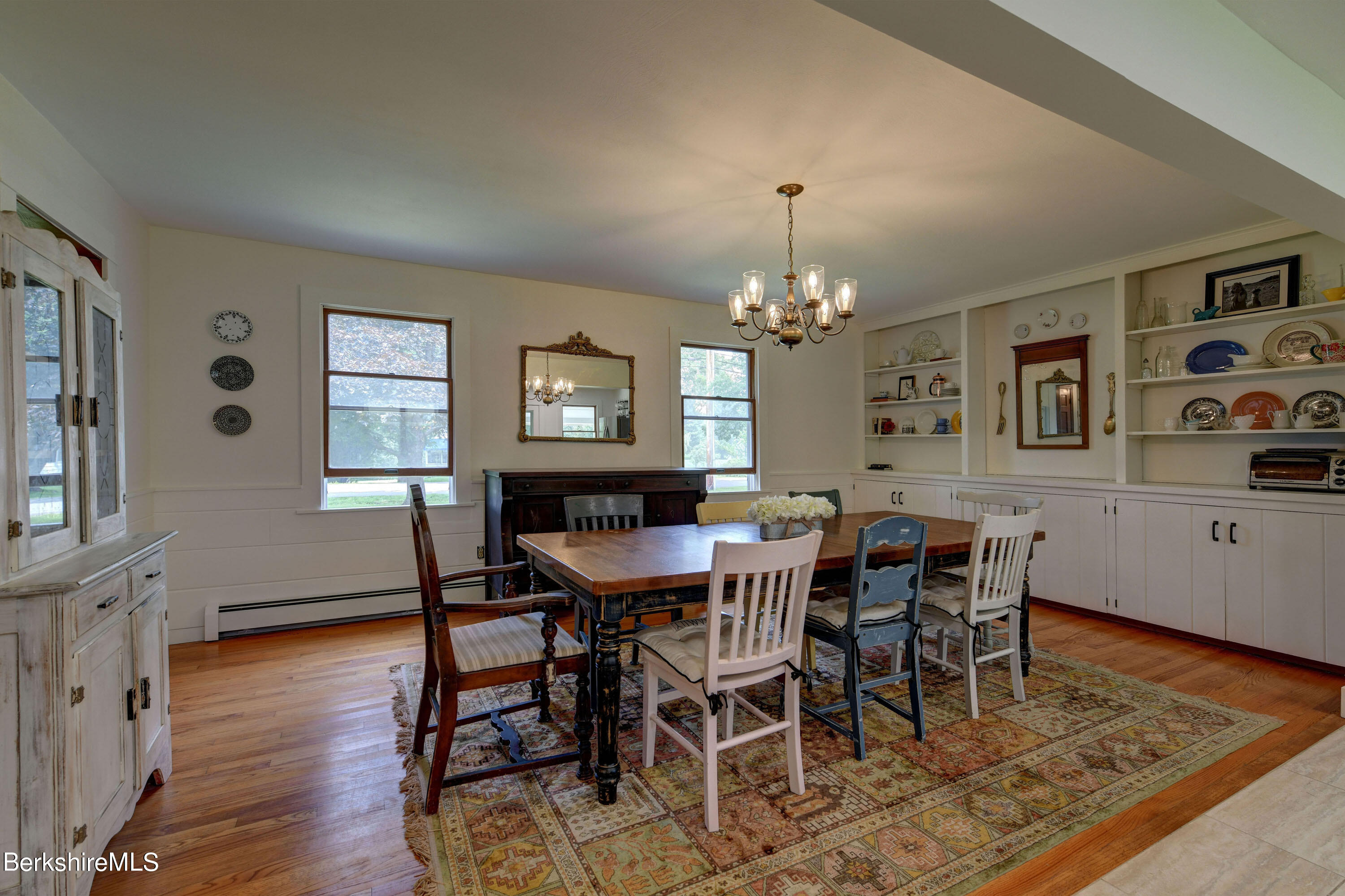 465 Devon Road Lee, MA 01238 - Photo 9 of 36 a view of a dining room with furniture and wooden floor