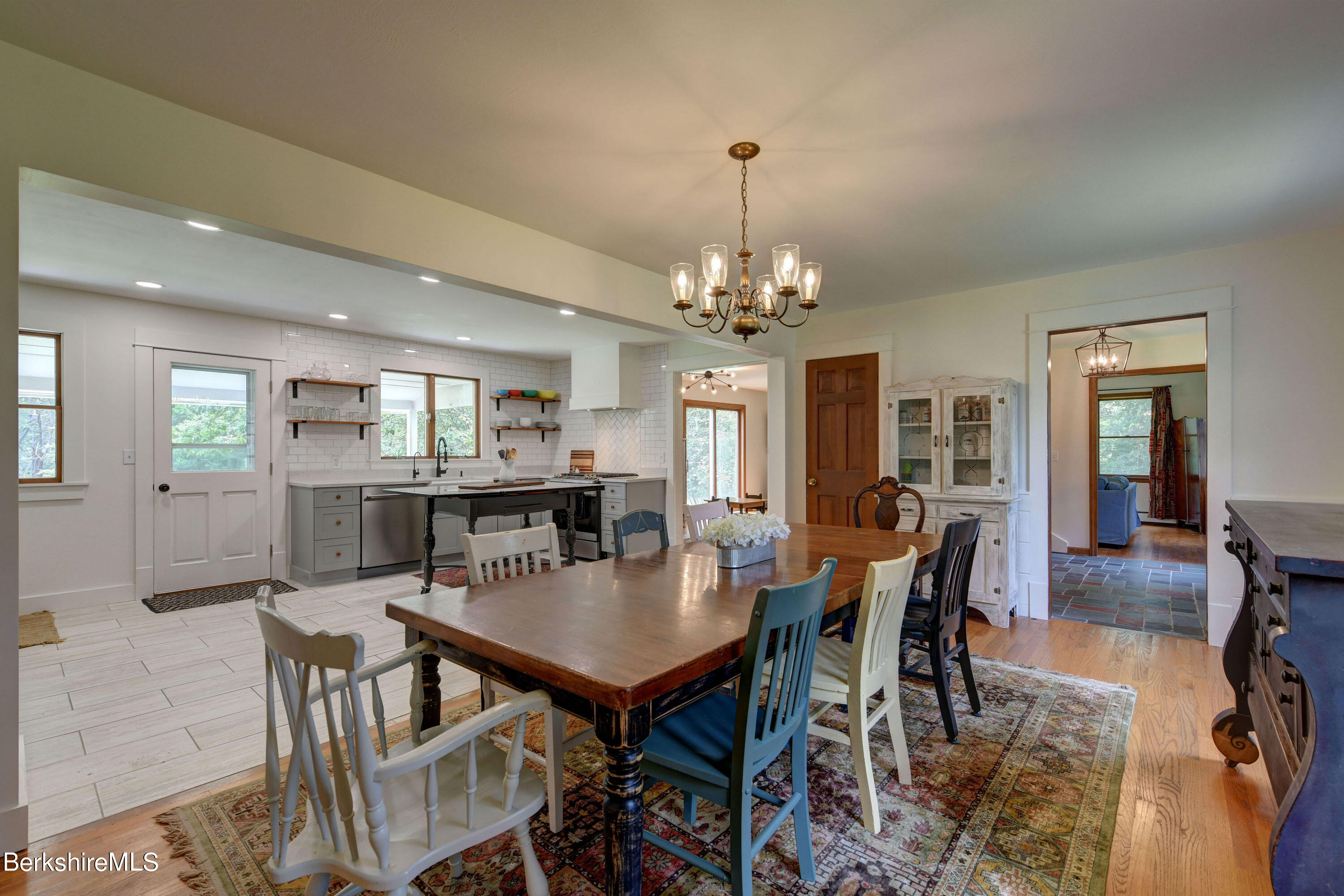 465 Devon Road Lee, MA 01238 - Photo 10 of 36 a view of a dining room with furniture and wooden floor