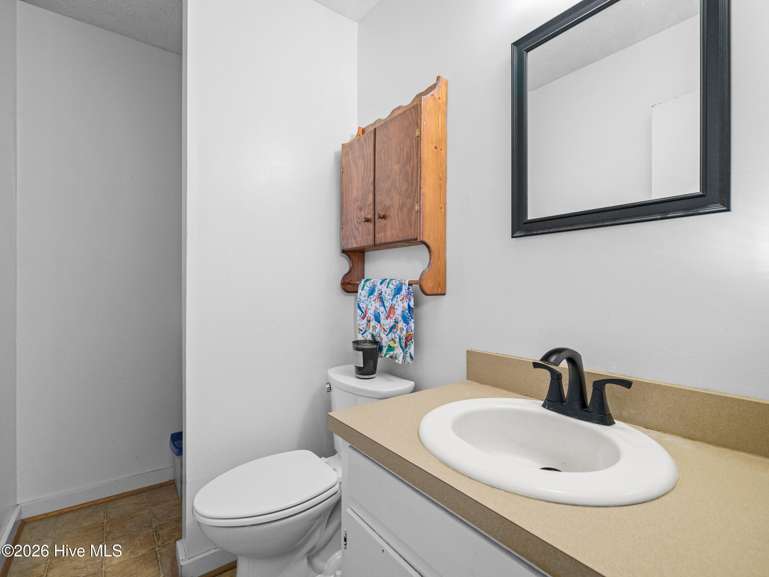 139 Bayberry Road Newport, NC 28570 - Photo 23 of 40 Half bath off primary bedroom