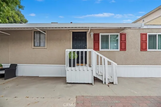 a view of a house with porch and wooden floor