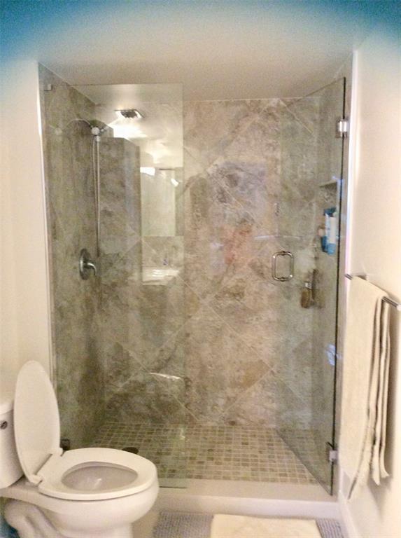 Undisclosed Address Pompano Beach, FL 33069 - Photo 18 of 23 a bathroom with a toilet and a shower