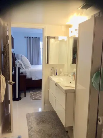 a view of a hallway with a living room