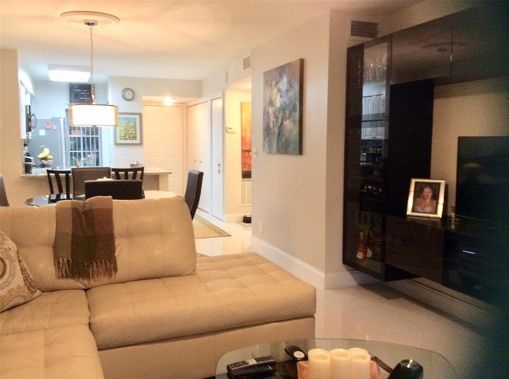 Undisclosed Address Pompano Beach, FL 33069 - Photo 2 of 23 a living room with furniture