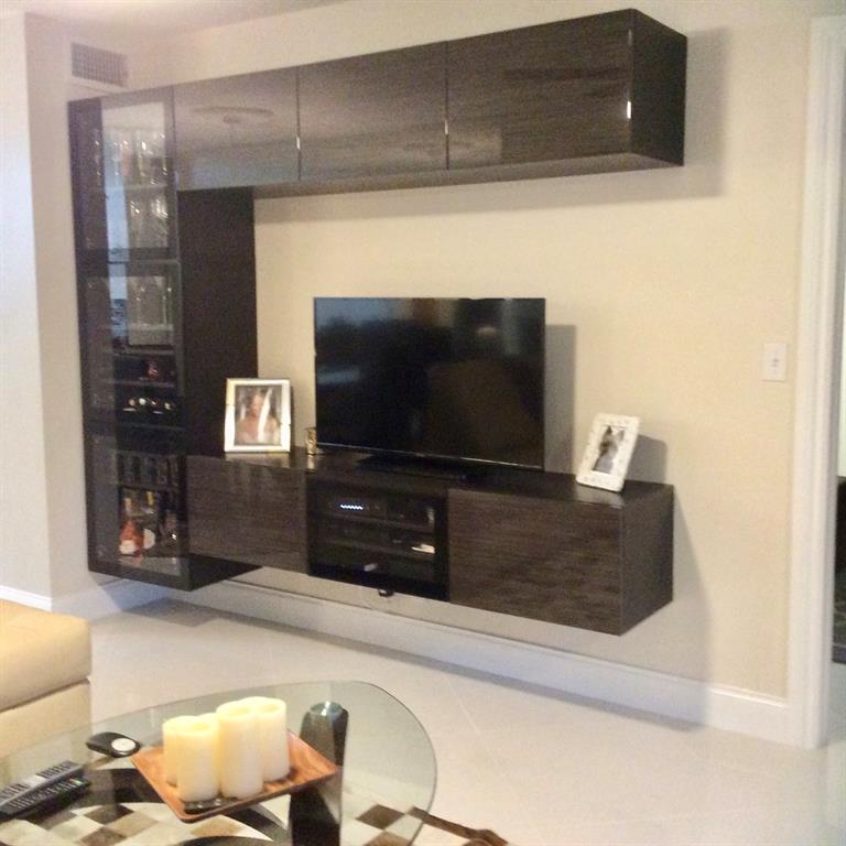 Undisclosed Address Pompano Beach, FL 33069 - Photo 6 of 23 a living room with furniture and a flat screen tv