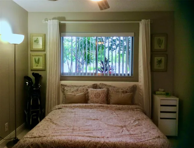 a workspace with furniture and window