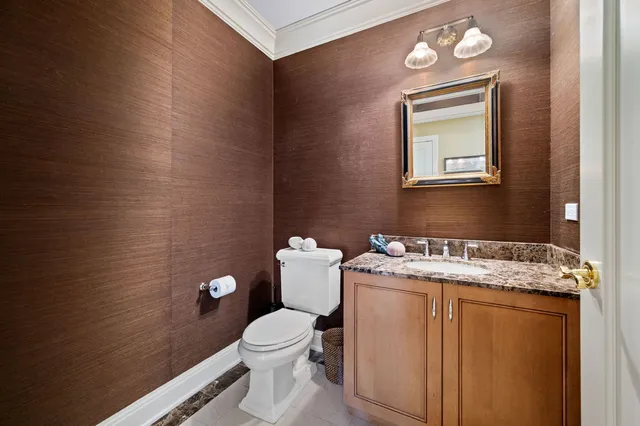 a view of hallway with wooden floor
