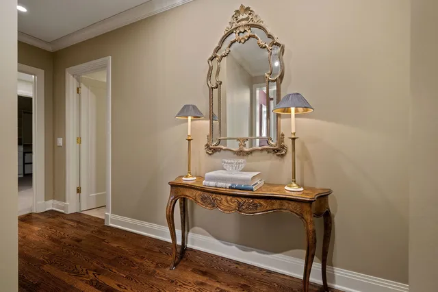 a bedroom with a bed and a lamp