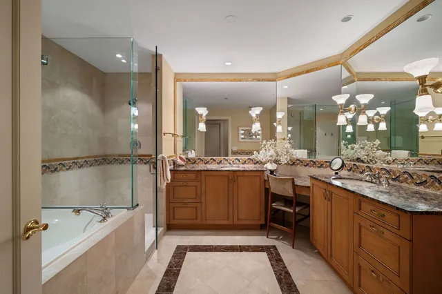 a bathroom with a bathtub and a sink