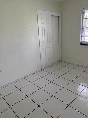 a view of a refrigerator and window