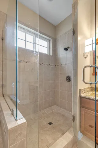a view of a patio with table and chairs and potted plants