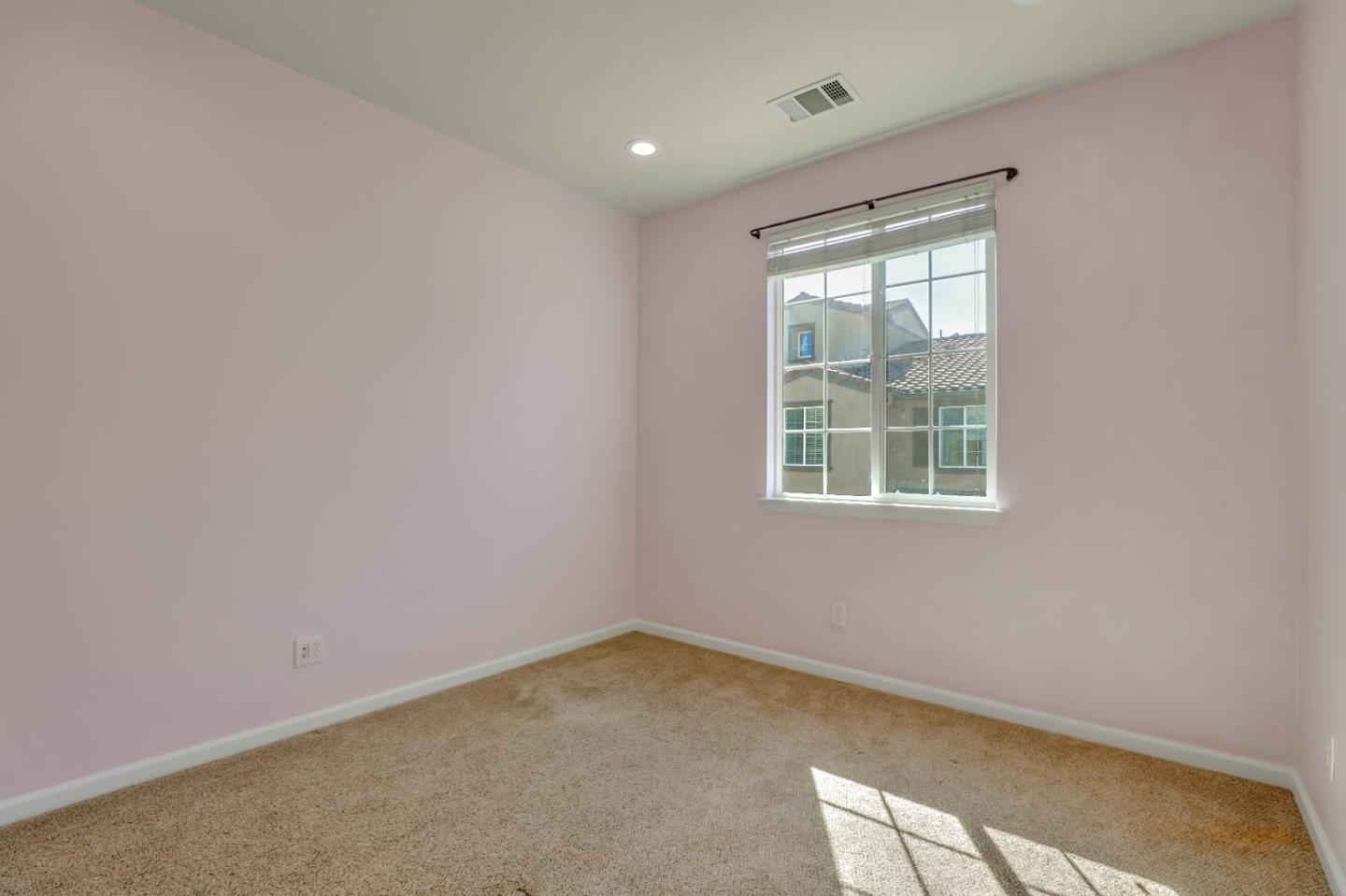 5090 Fioli Loop San Ramon, CA 94582 - Photo 15 of 36 an empty room with a window