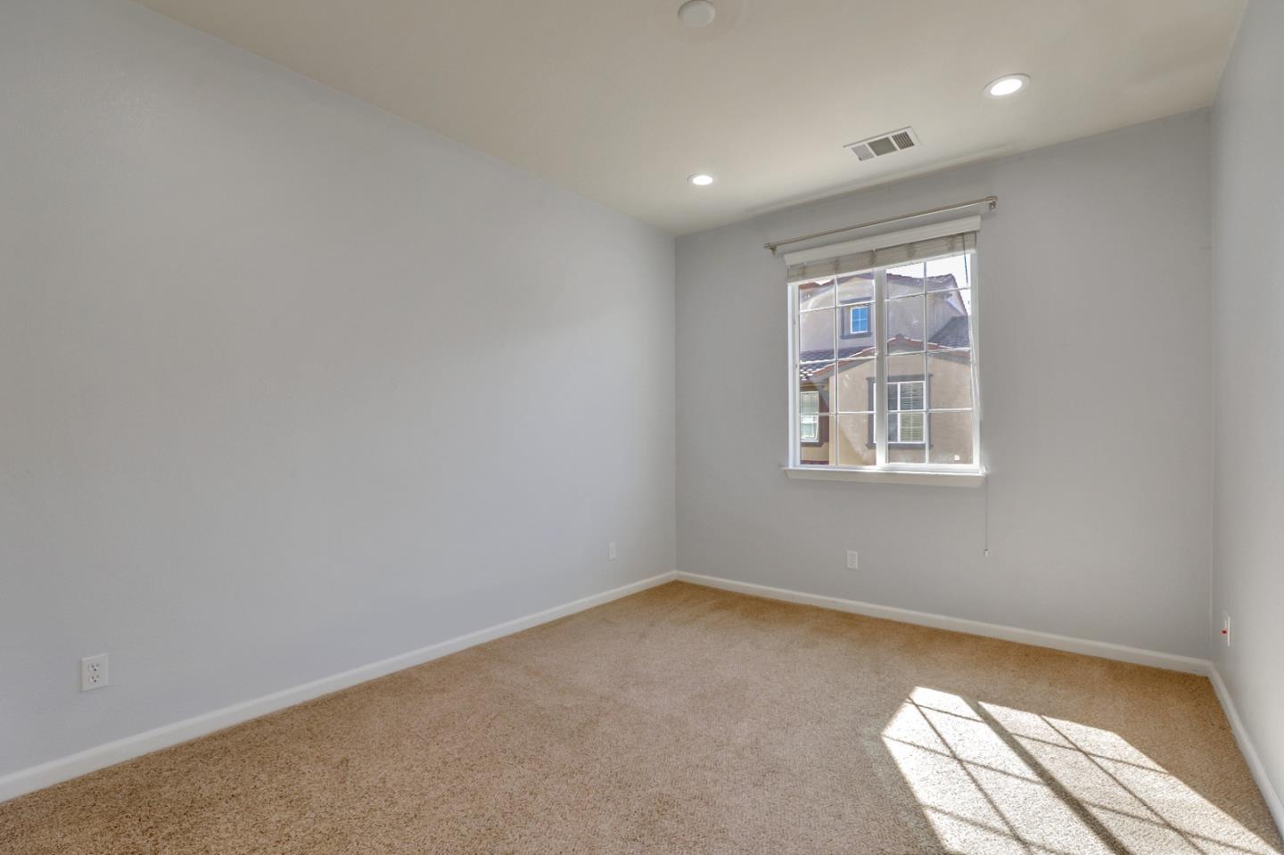 5090 Fioli Loop San Ramon, CA 94582 - Photo 17 of 36 an empty room with a window
