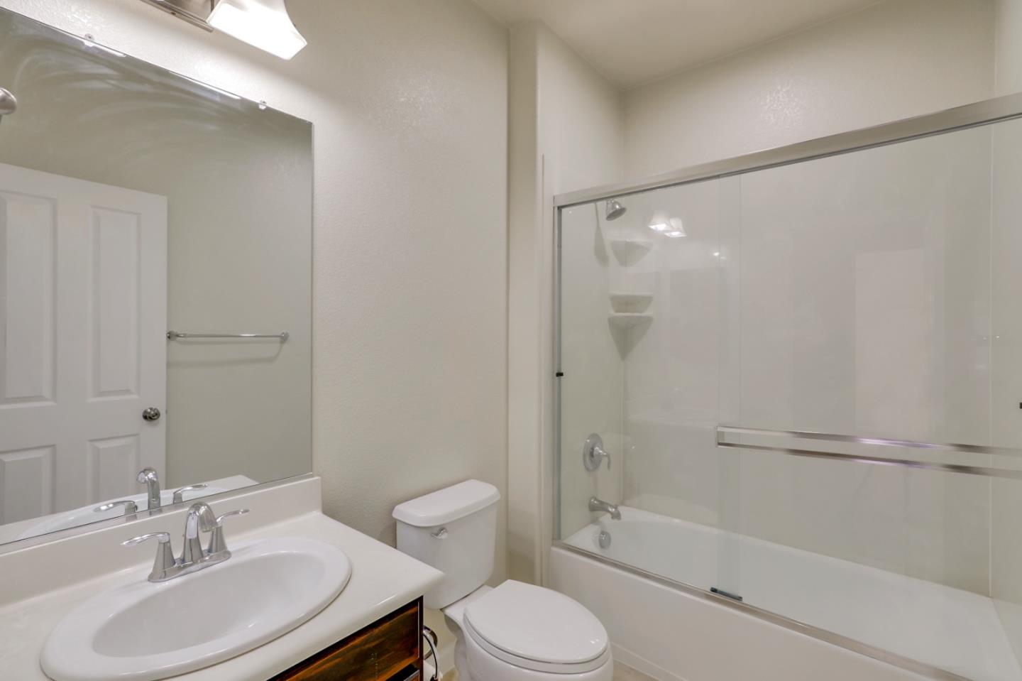 5090 Fioli Loop San Ramon, CA 94582 - Photo 20 of 36 a bathroom with a sink toilet and shower