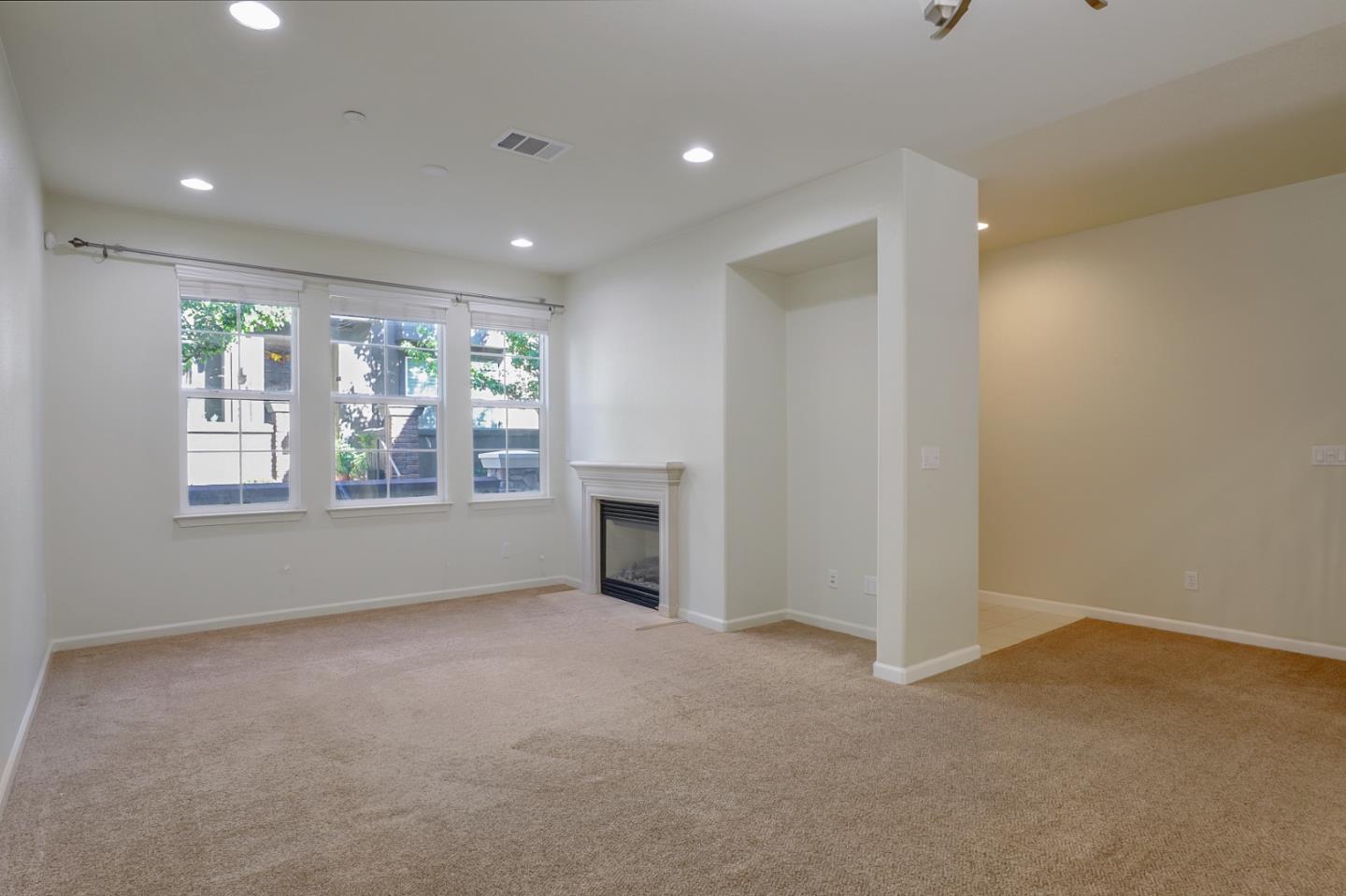 5090 Fioli Loop San Ramon, CA 94582 - Photo 3 of 36 a view of an empty room with a window