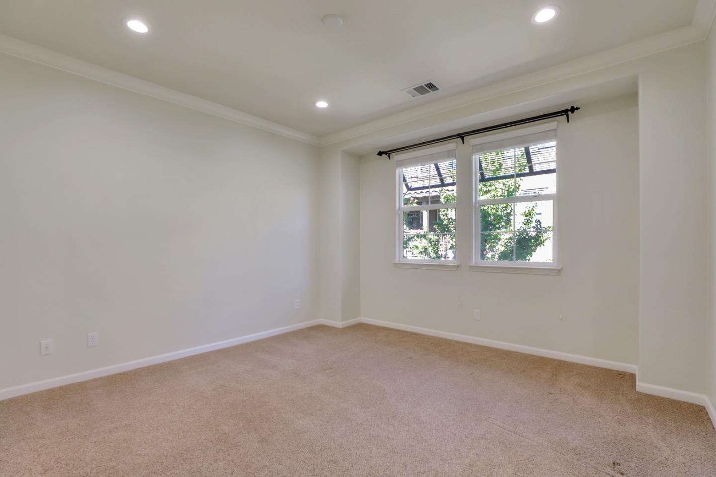 5090 Fioli Loop San Ramon, CA 94582 - Photo 21 of 36 an empty room with windows