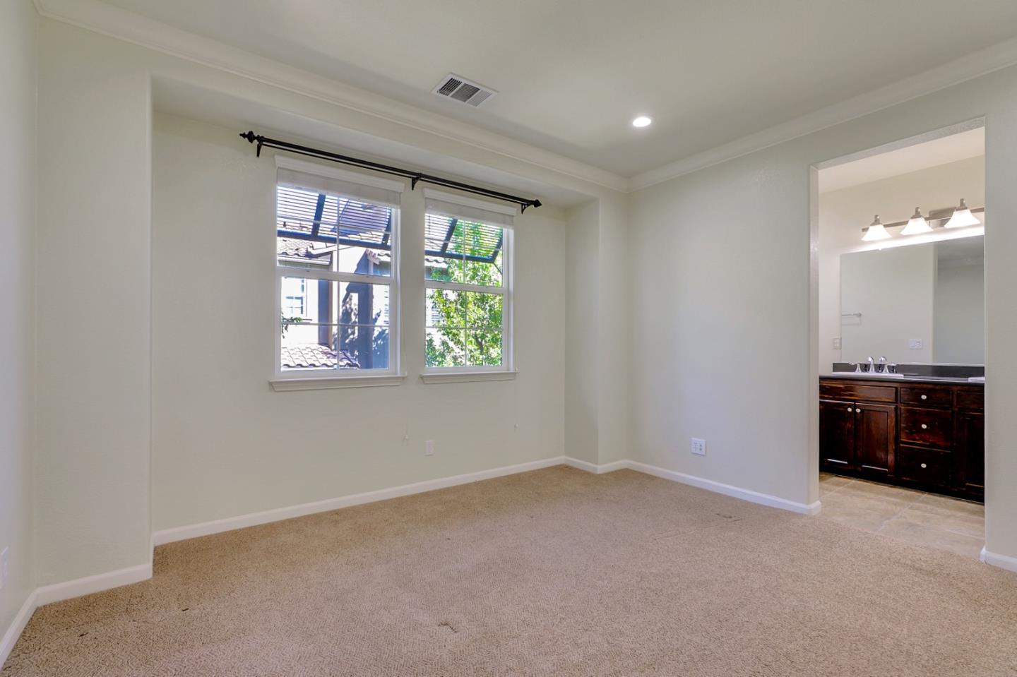 5090 Fioli Loop San Ramon, CA 94582 - Photo 22 of 36 a view of an empty room with a window