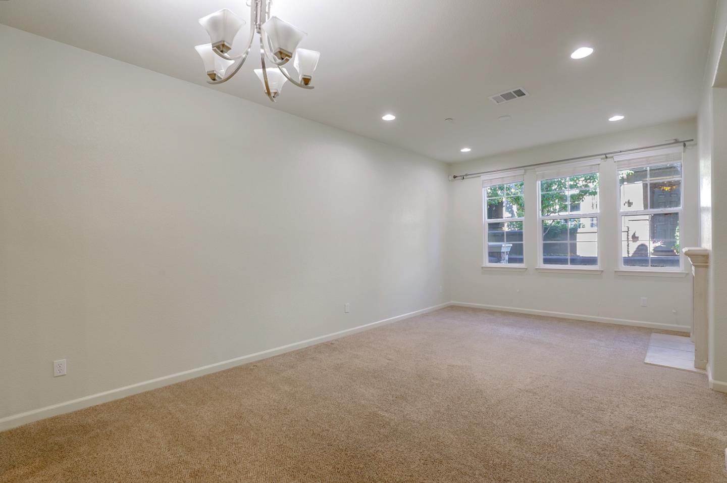 5090 Fioli Loop San Ramon, CA 94582 - Photo 9 of 36 a view of an empty room with a window