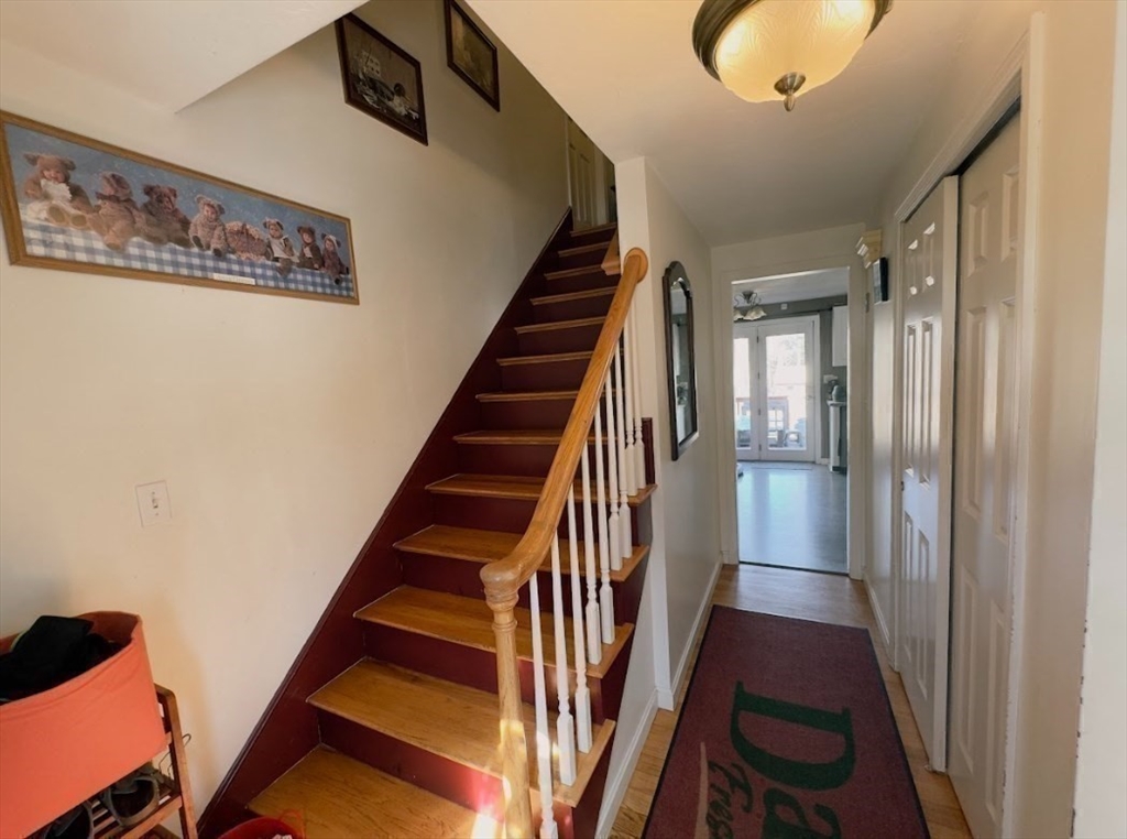 84 Chester Street Worcester, MA 01605 - Photo 15 of 21 a view of entryway and hall with wooden floor