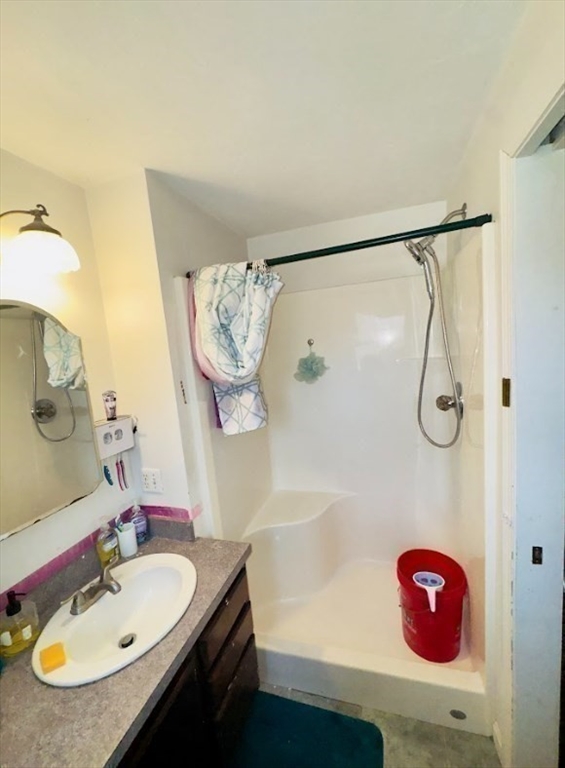 84 Chester Street Worcester, MA 01605 - Photo 16 of 21 a bathroom with a sink and a mirror