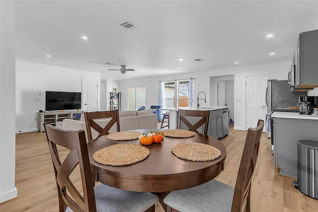 a view of a dining room with furniture
