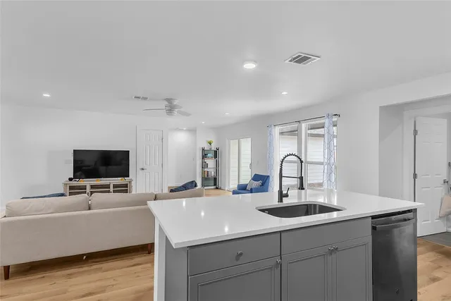 a view of backyard with outdoor seating and green space