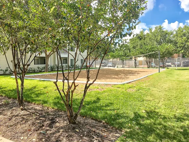 a view of yard with swimming pool