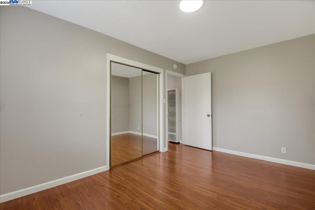323 De Leon Avenue Fremont, CA 94539 - Photo 12 of 16 a view of an empty room with wooden floor
