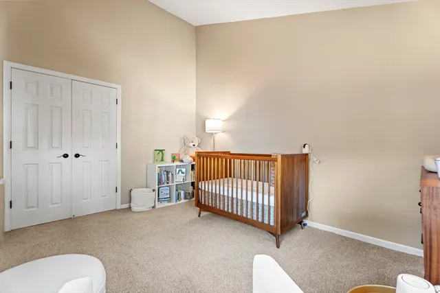 a bedroom with a bed and closet