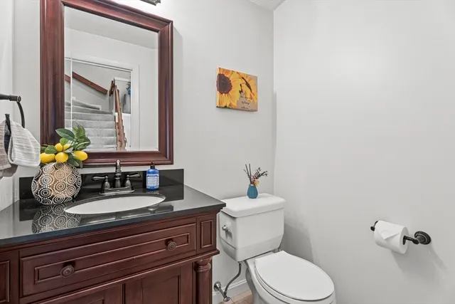 a bathroom with a sink double vanity and a mirror