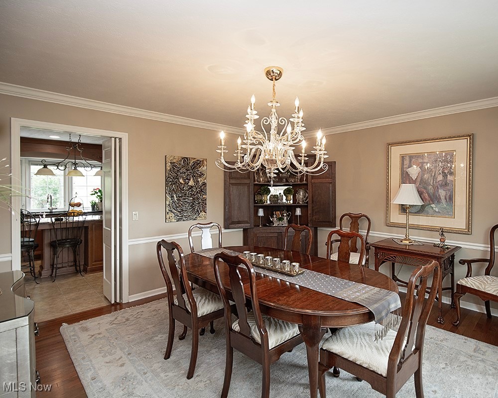 663 Beech Street Oberlin, OH 44074 - Photo 4 of 32 Spacious dining room with crown molding and chair rail