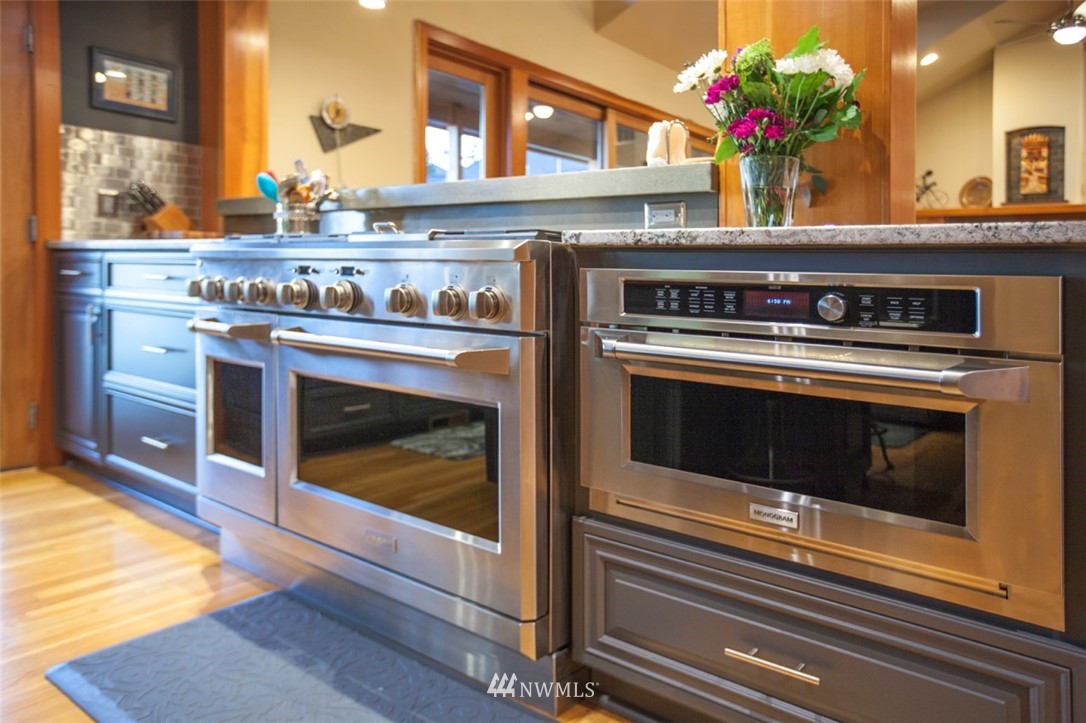 804 Fieldston Road Bellingham, WA 98225 - Photo 14 of 40 a stove top oven sitting inside of a kitchen
