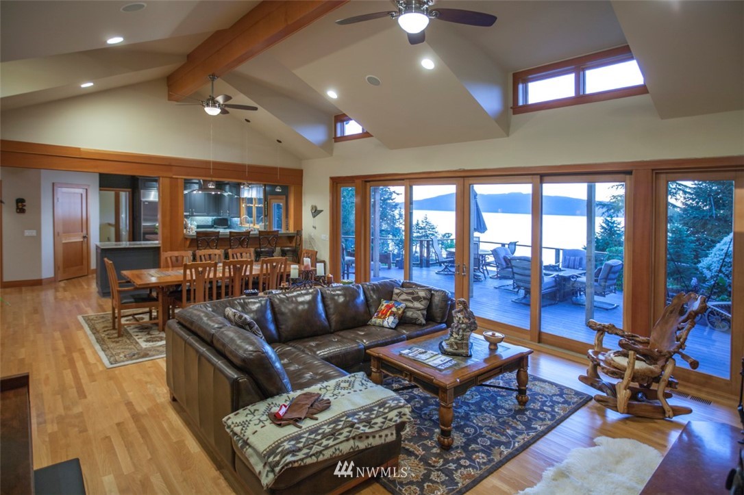 804 Fieldston Road Bellingham, WA 98225 - Photo 7 of 40 a living room with furniture a rug and a floor to ceiling window