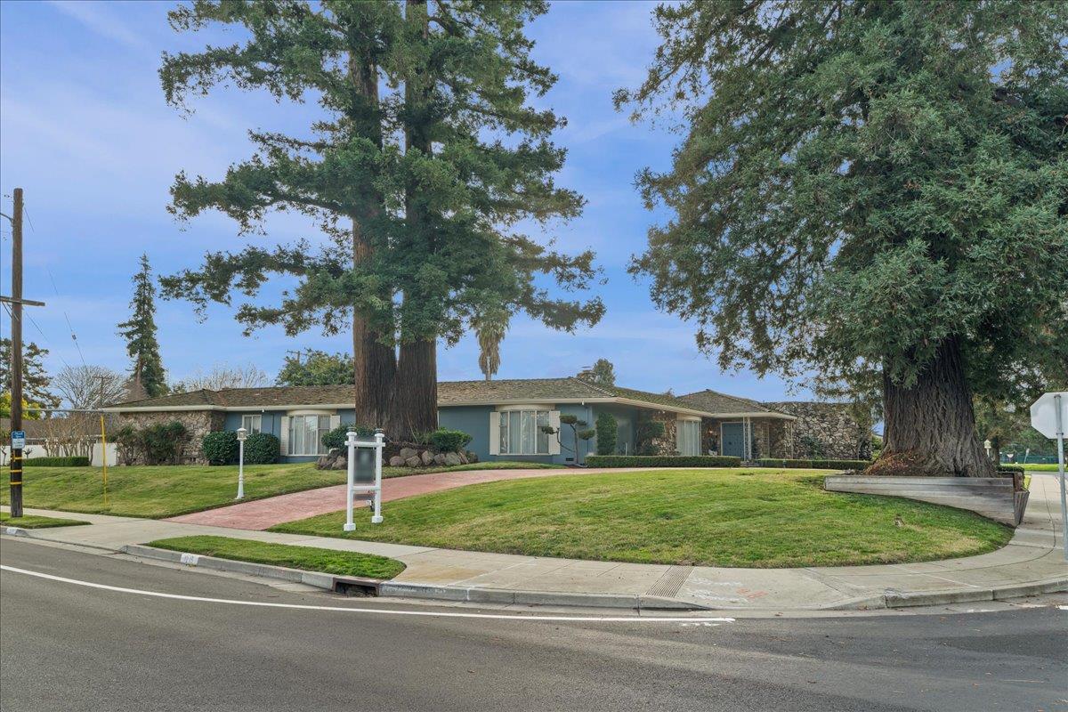 1215 Camino Ramon San Jose, CA 95125 - Photo 17 of 76 a front view of house with yard and green space