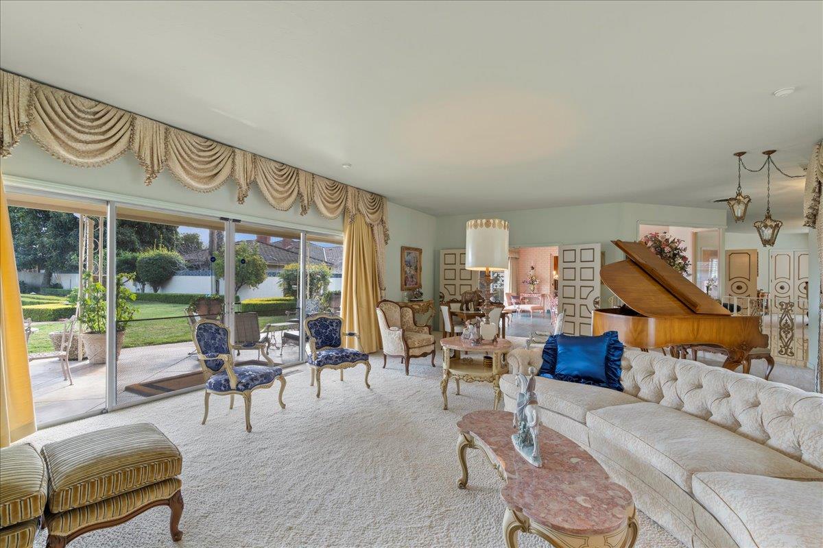 1215 Camino Ramon San Jose, CA 95125 - Photo 23 of 76 a living room with furniture and a floor to ceiling window