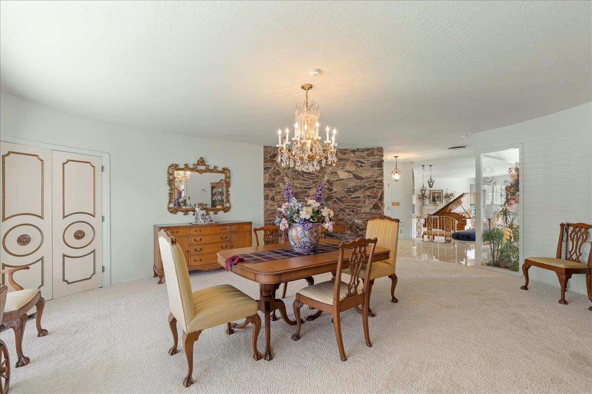 1215 Camino Ramon San Jose, CA 95125 - Photo 27 of 76 a view of a dining room with furniture and chandelier