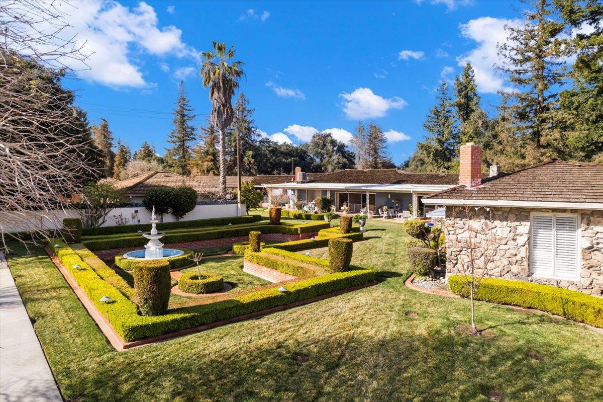 1215 Camino Ramon San Jose, CA 95125 - Photo 4 of 76 a view of a swimming pool with a patio and a yard
