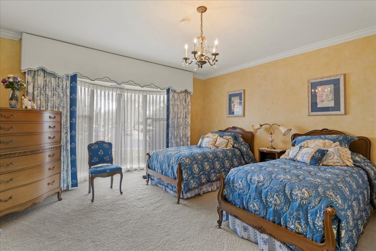 1215 Camino Ramon San Jose, CA 95125 - Photo 45 of 76 a spacious bedroom with two beds and a dresser